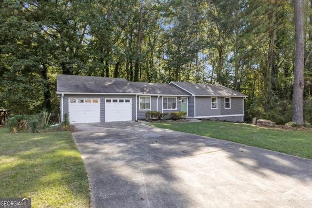 single story home featuring a front yard and a garage