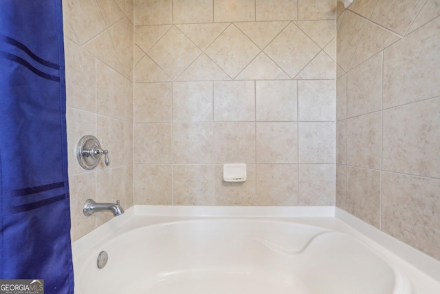 bathroom with shower / tub combo