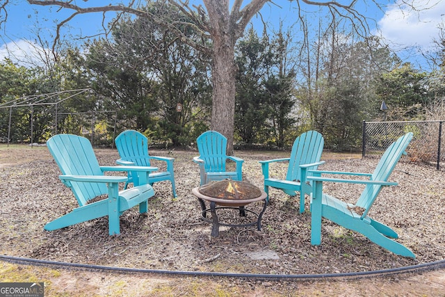 view of patio with an outdoor fire pit