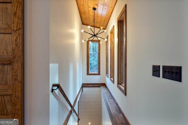 spare room featuring wooden ceiling and ceiling fan