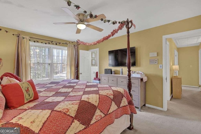 bedroom featuring light colored carpet and ceiling fan