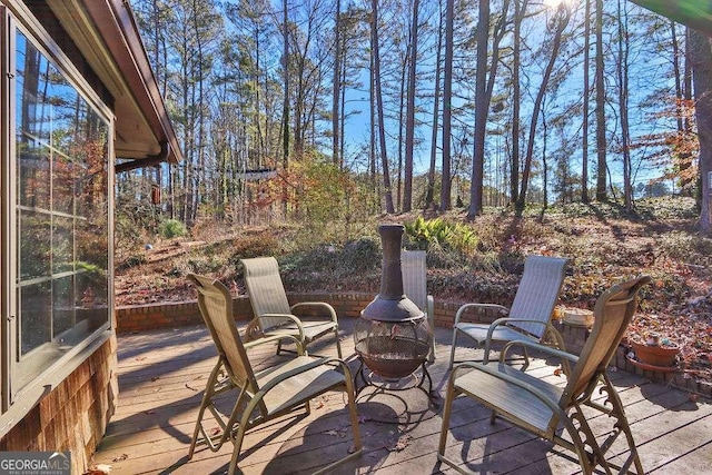 deck with a fire pit