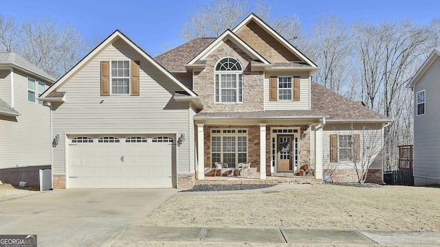 view of front of property with a garage