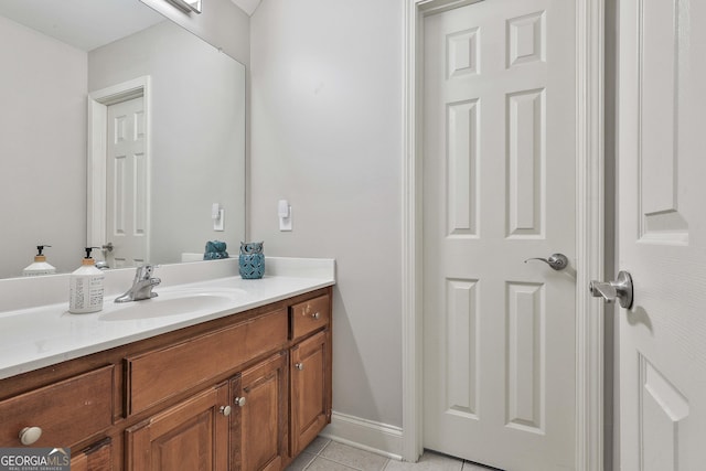 bathroom with vanity and tile patterned flooring