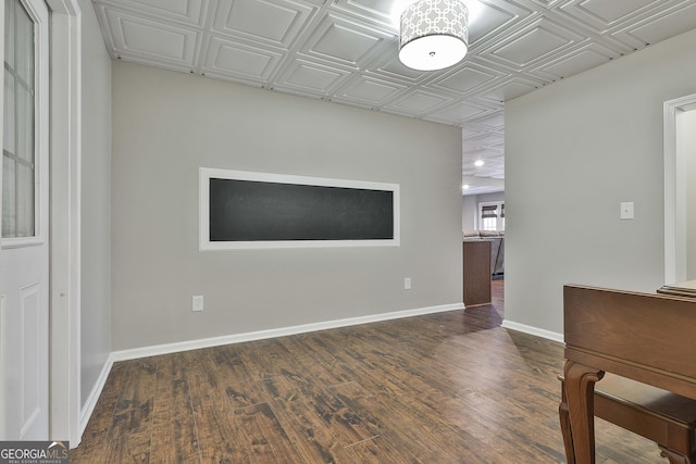 empty room featuring dark hardwood / wood-style flooring