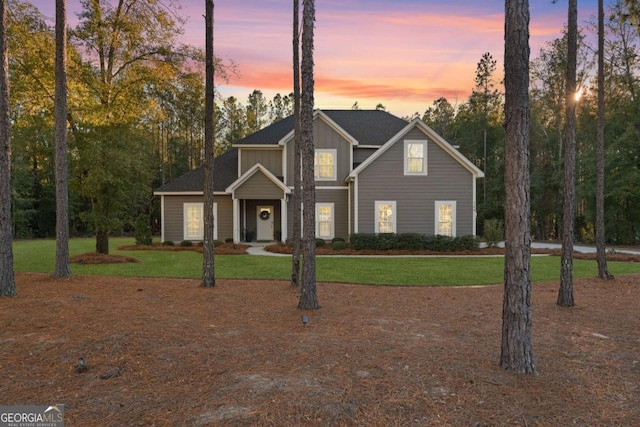 view of front of house with a lawn