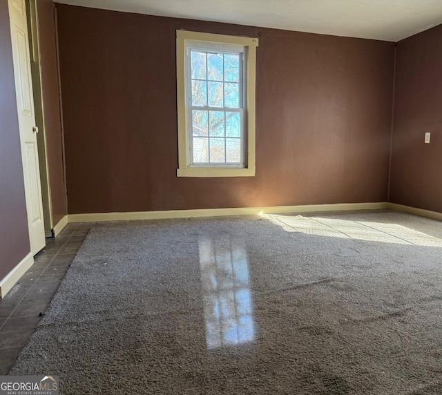 view of tiled spare room