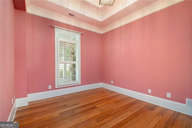 unfurnished room featuring wood-type flooring