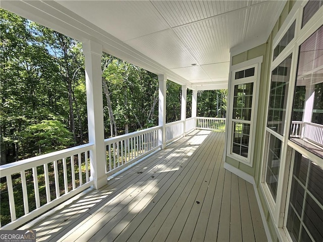 wooden deck featuring a porch