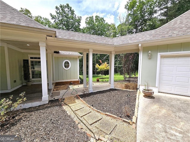 view of patio featuring a garage