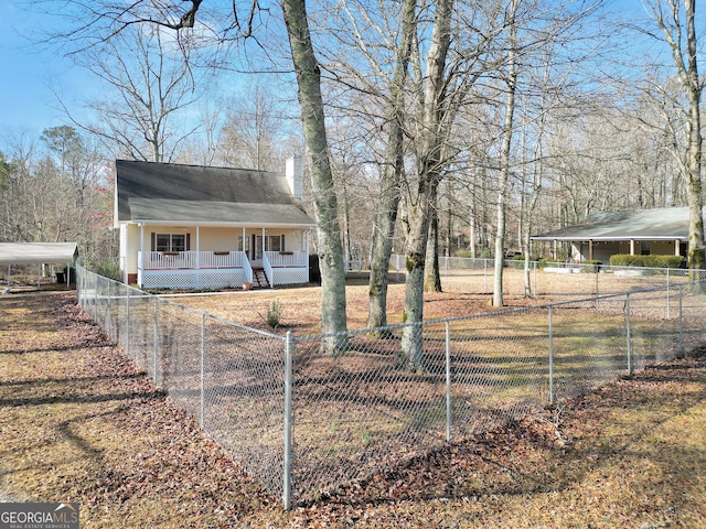 view of yard with covered porch