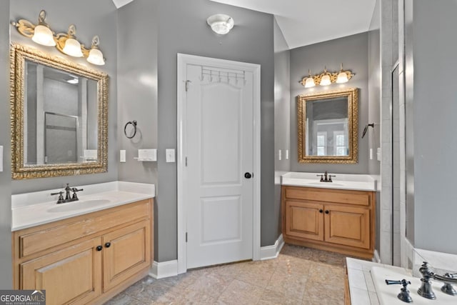 bathroom featuring vanity and a shower