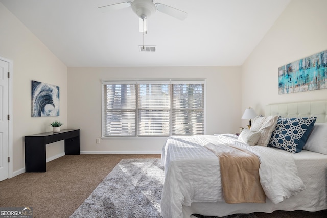 carpeted bedroom featuring ceiling fan and vaulted ceiling