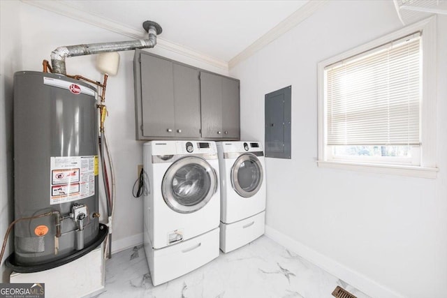 laundry area featuring cabinets, crown molding, water heater, washing machine and dryer, and electric panel