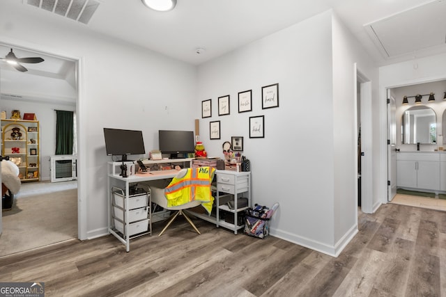 office area with wood-type flooring