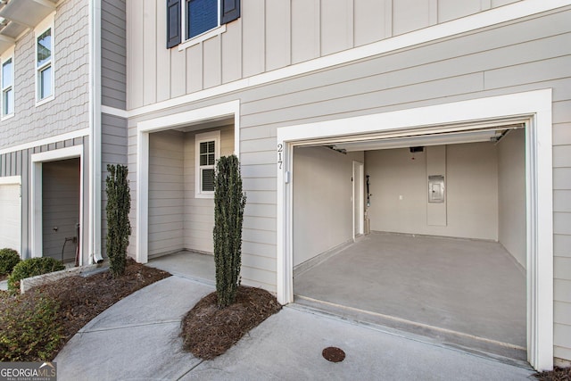 doorway to property featuring a garage