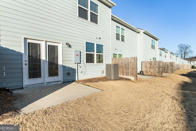 rear view of property featuring a patio area