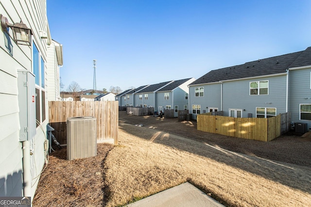 view of yard featuring central AC unit