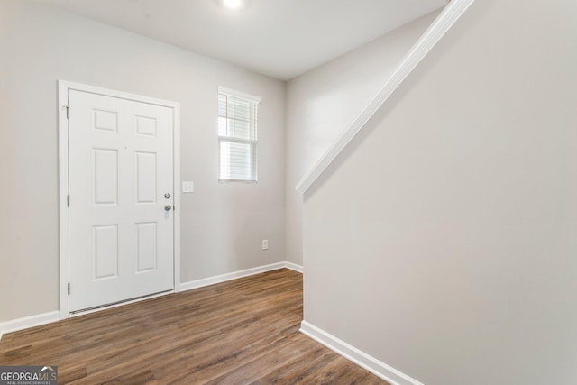 foyer entrance with dark hardwood / wood-style flooring