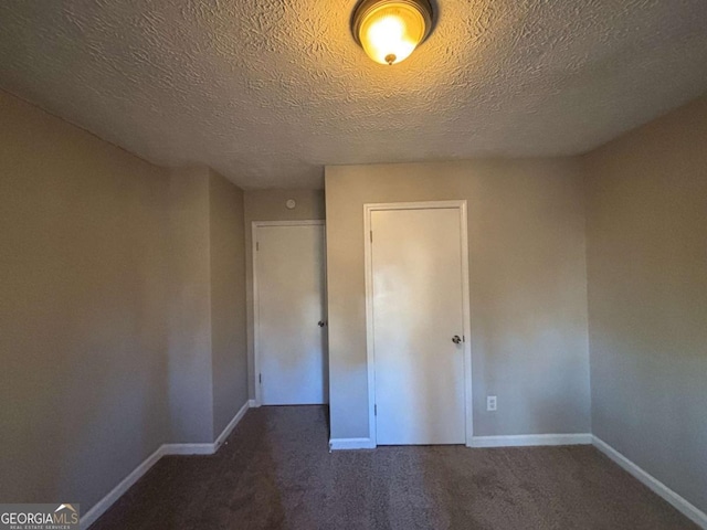 interior space featuring a textured ceiling