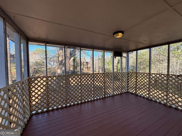 unfurnished sunroom with a healthy amount of sunlight