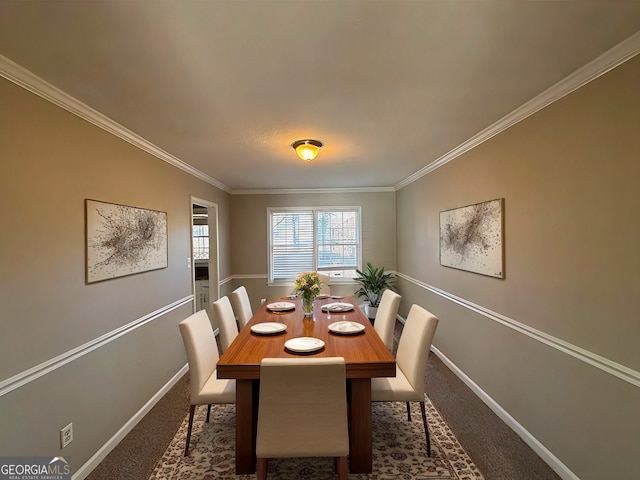 carpeted dining space featuring crown molding