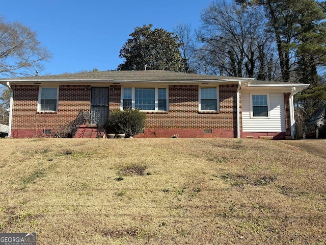 ranch-style home with a front yard