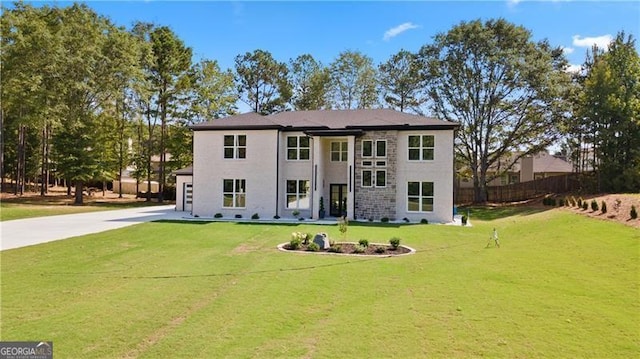 view of front of property with a front lawn