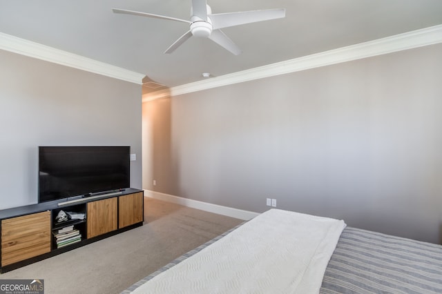 bedroom with ceiling fan, light colored carpet, and ornamental molding