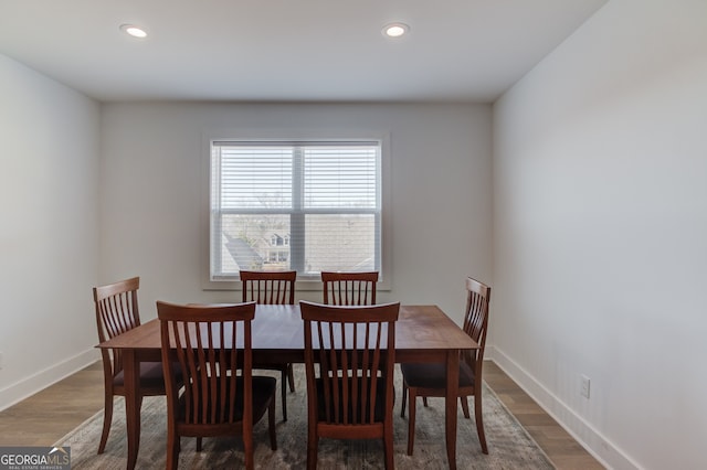 dining room featuring wood-type flooring