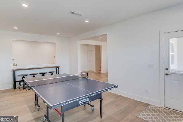 playroom featuring light wood-type flooring