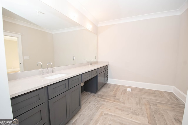 bathroom with vanity, ornamental molding, and parquet flooring