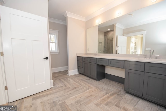 bathroom featuring parquet flooring, a shower, vanity, and crown molding