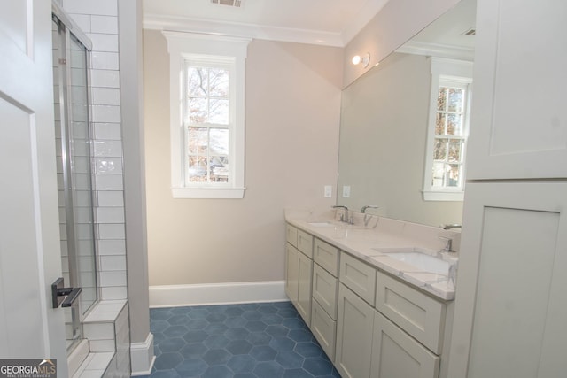 bathroom with vanity, tile patterned floors, and crown molding