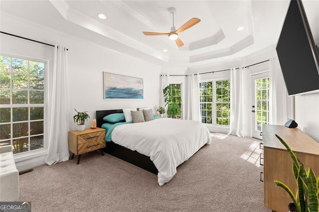 bedroom with recessed lighting, ornamental molding, access to outside, a raised ceiling, and light carpet