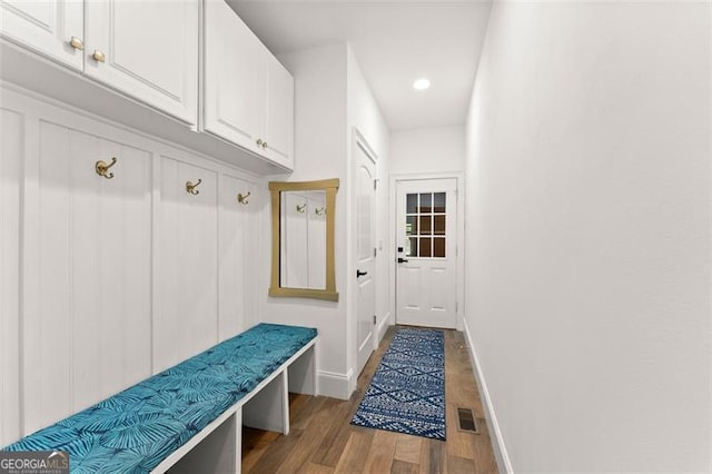 mudroom with light hardwood / wood-style floors