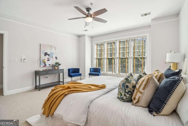 bedroom with ceiling fan and carpet floors