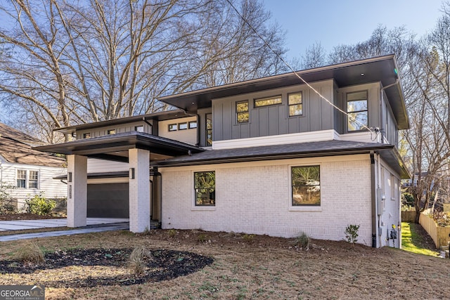 view of front of property with a garage