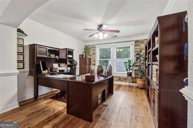 office with hardwood / wood-style floors, ceiling fan, and ornamental molding