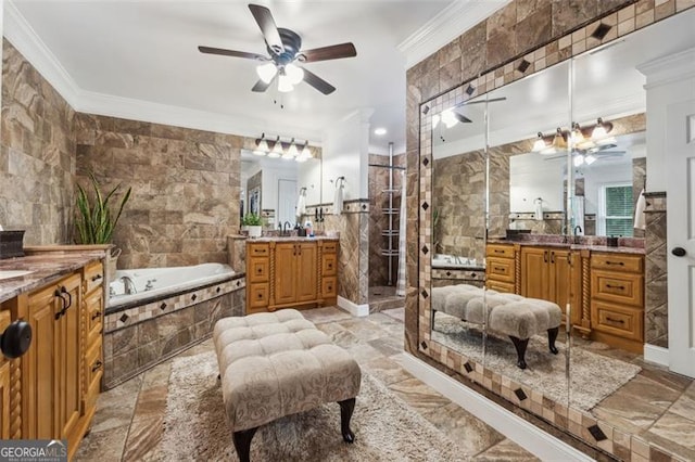 bathroom with vanity, crown molding, ceiling fan, and independent shower and bath