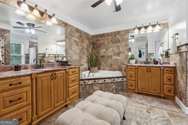 bathroom featuring vanity, a relaxing tiled tub, and crown molding