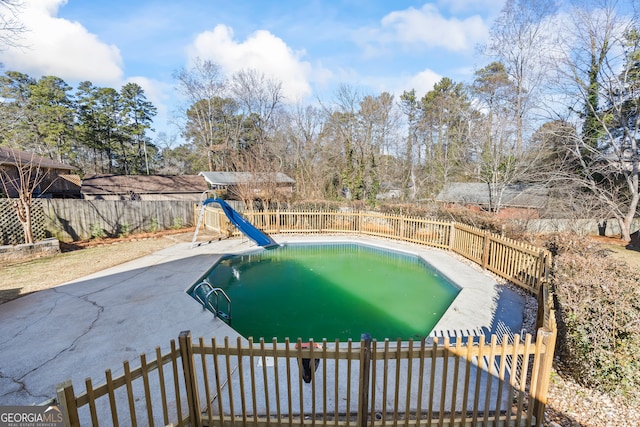 view of pool featuring a patio