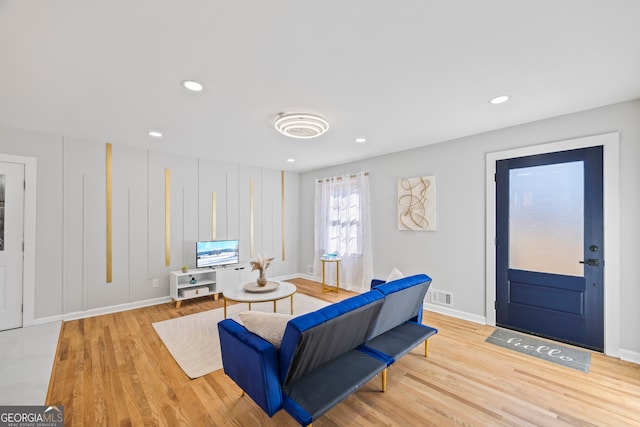 living room featuring light wood-type flooring