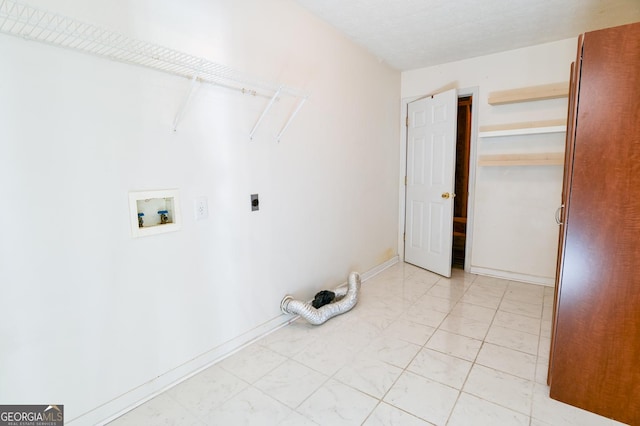 washroom with hookup for an electric dryer and washer hookup