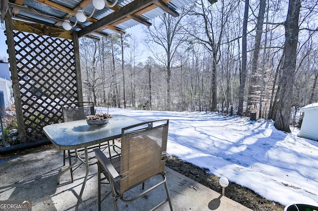 view of snow covered patio