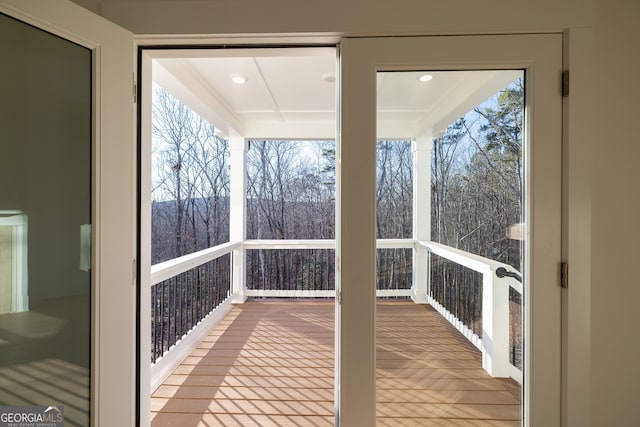 unfurnished sunroom with a healthy amount of sunlight