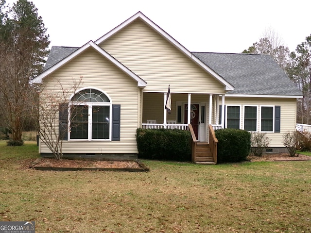 view of front of home featuring covered porch and a front lawn