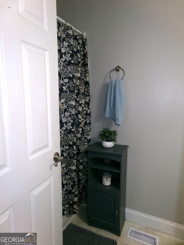 bathroom featuring tile patterned floors