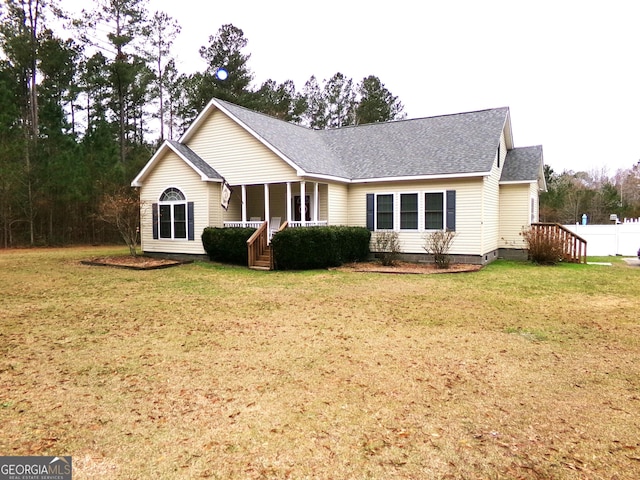 view of front of home featuring a porch and a front lawn