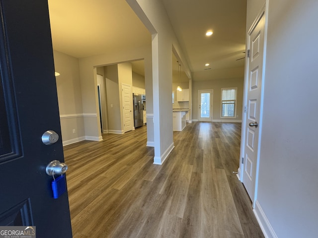 foyer entrance with hardwood / wood-style flooring